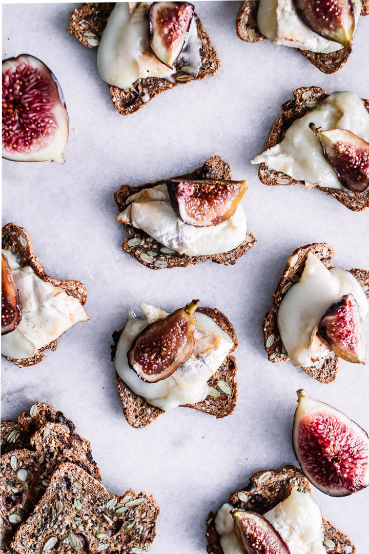 Assorted crostini with brie and figs.