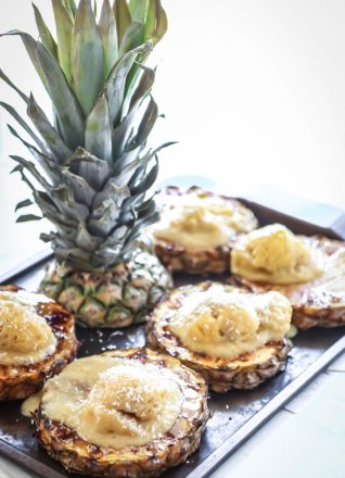 Grilled Pineapple with Mango Banana Nice Cream topped with fresh coconut and a bourbon sauce drizzle, a fresh and tasty tropical summer treat!