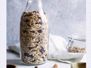 A jar of homemade maple walnut granola with the words 