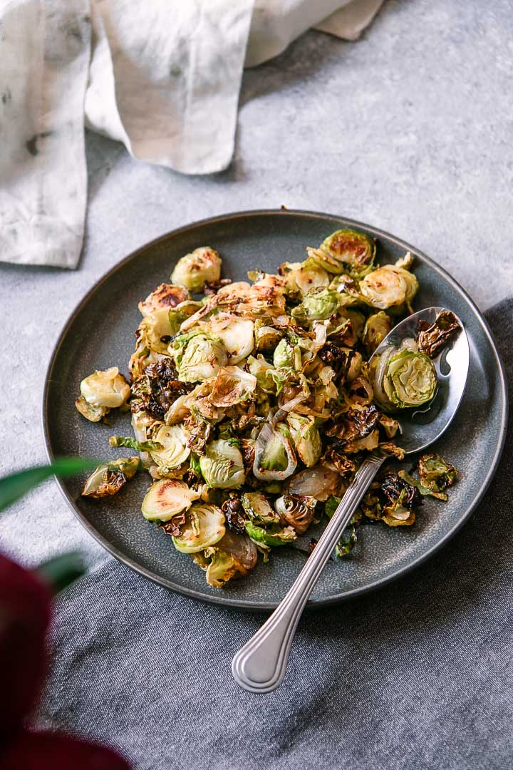 A plate of shredded and roasted brussels sprouts