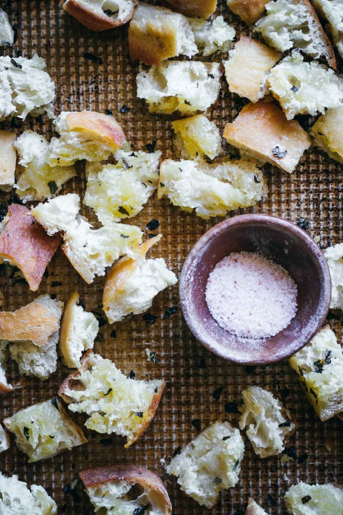 cooked ciabatta croutons on a baking sheet