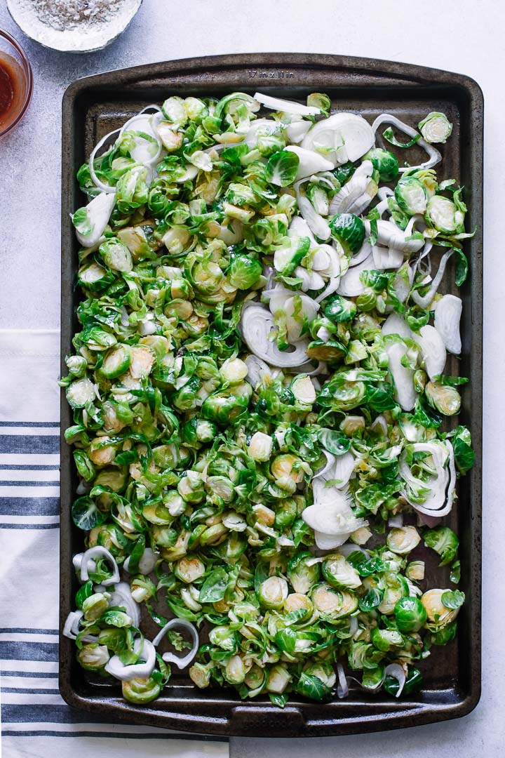 A sheet pan with roasted brussels sprouts.