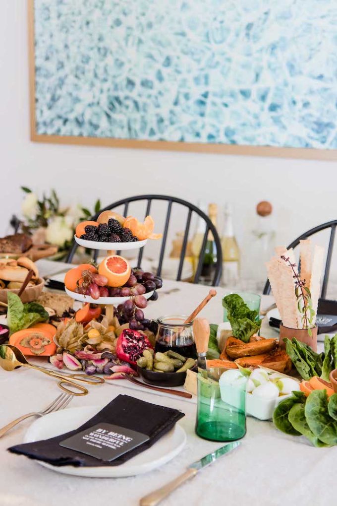 A table with food and the words "what is green eating" in black writing.