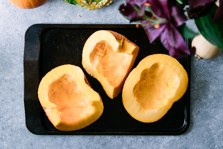 sliced pumpkins on a cookie sheet