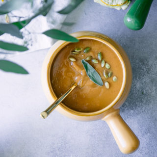 instant pot pumpkin sage soup on a blue and white table
