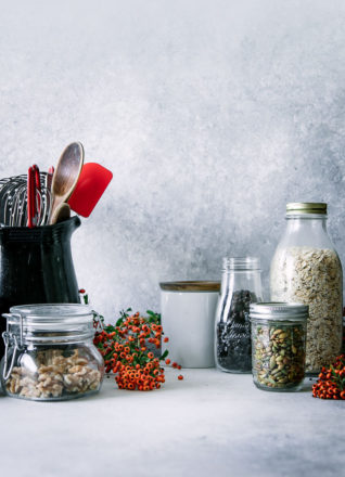Eco-friendly glass food jars on a kitchen counter