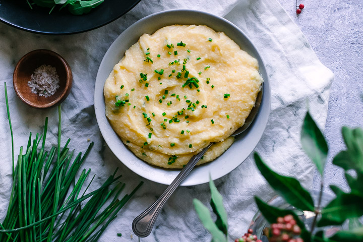 polenta with cheddar and chives on a white napkin