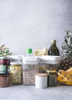 ars and boxes of food and fruit on a kitchen counter