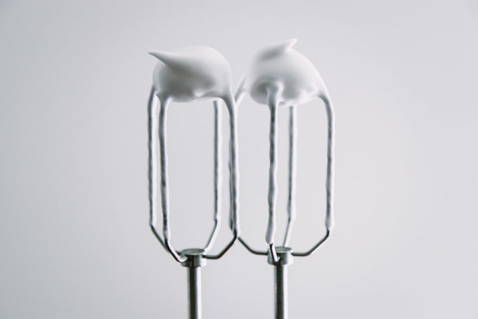 aquafaba stiff peaks on the tips of blender whisk attachments