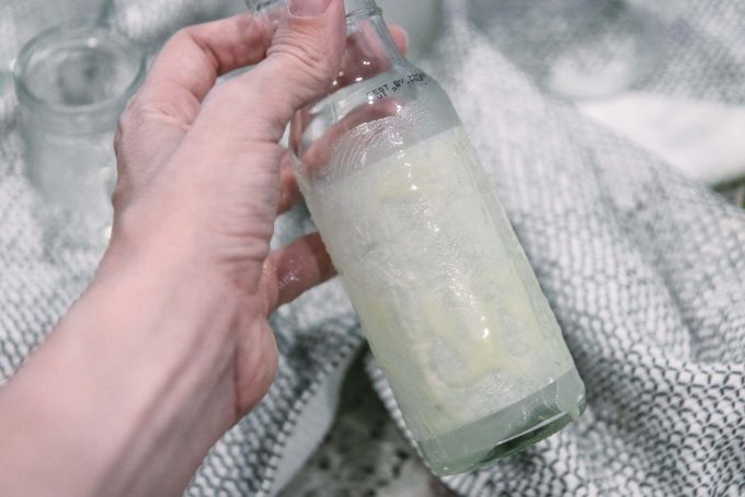 oil and baking soda rubbed onto a sticky label on an empty glass food jar