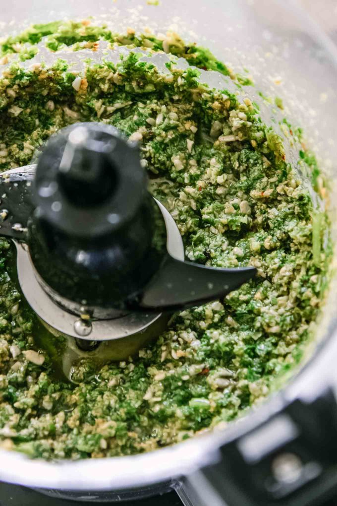 pesto sauce inside a food processor