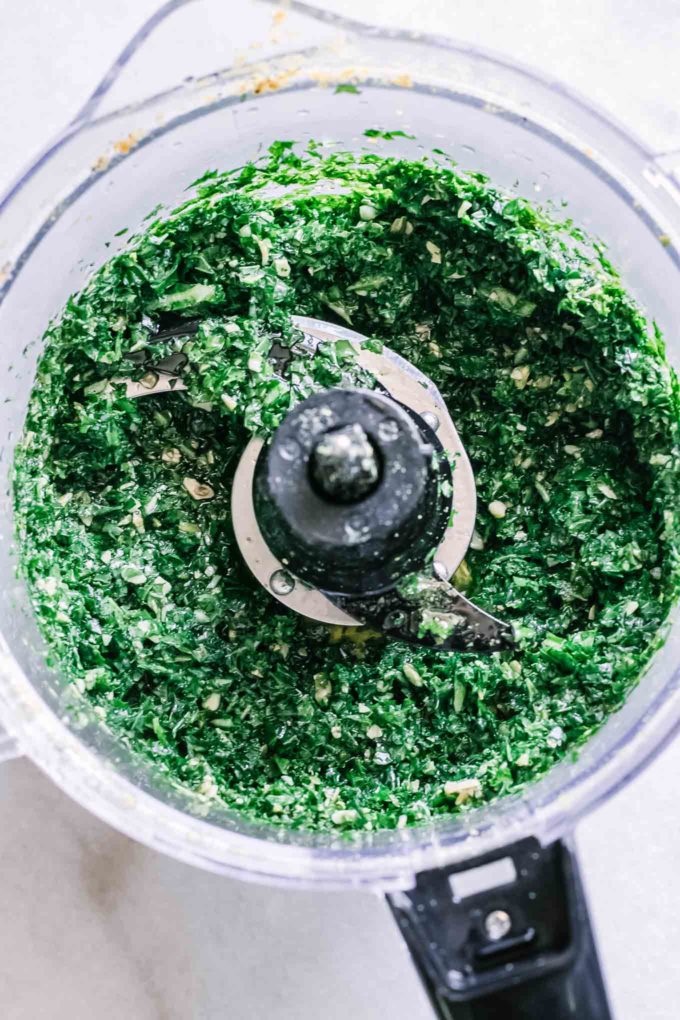 blended pesto inside a food processor