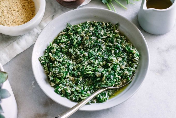 parsley pesto in a blue bowl