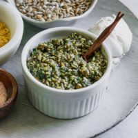 sunflower seed pesto in a white bowl