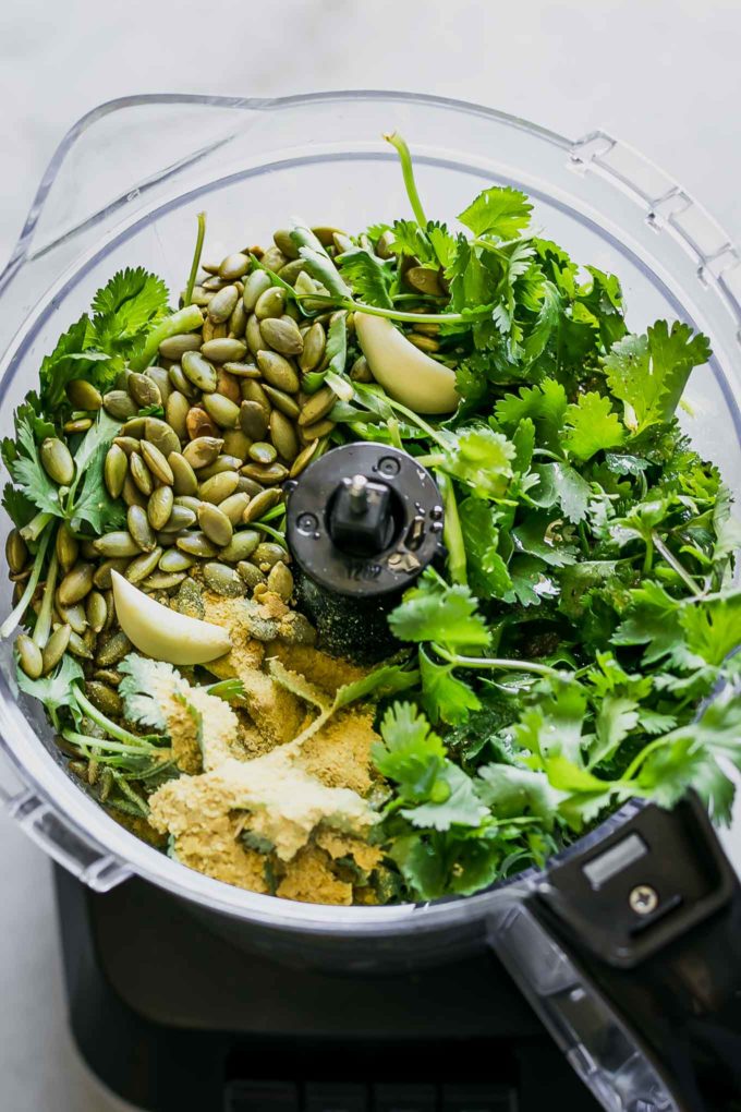 cilantro, garlic, seeds, nutritional yeast, and oil in a food processor