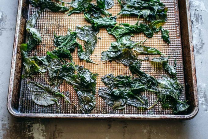 baked radish greens on a baking sheet