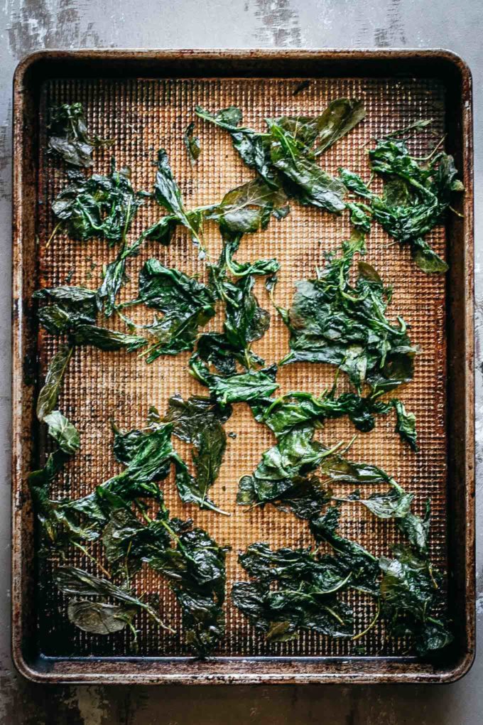 crispy radish greens on a baking pan