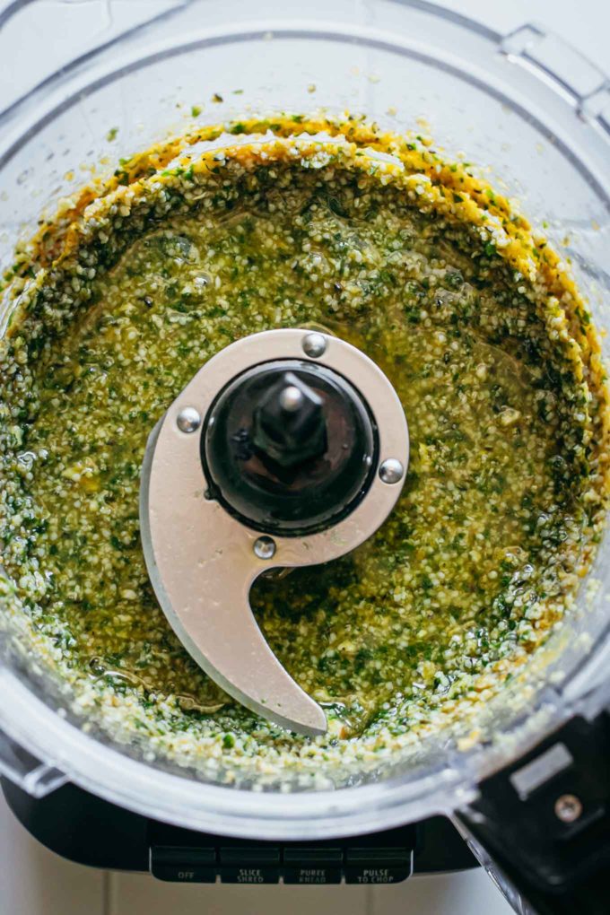 blended hemp seed pesto ingredients in food processor