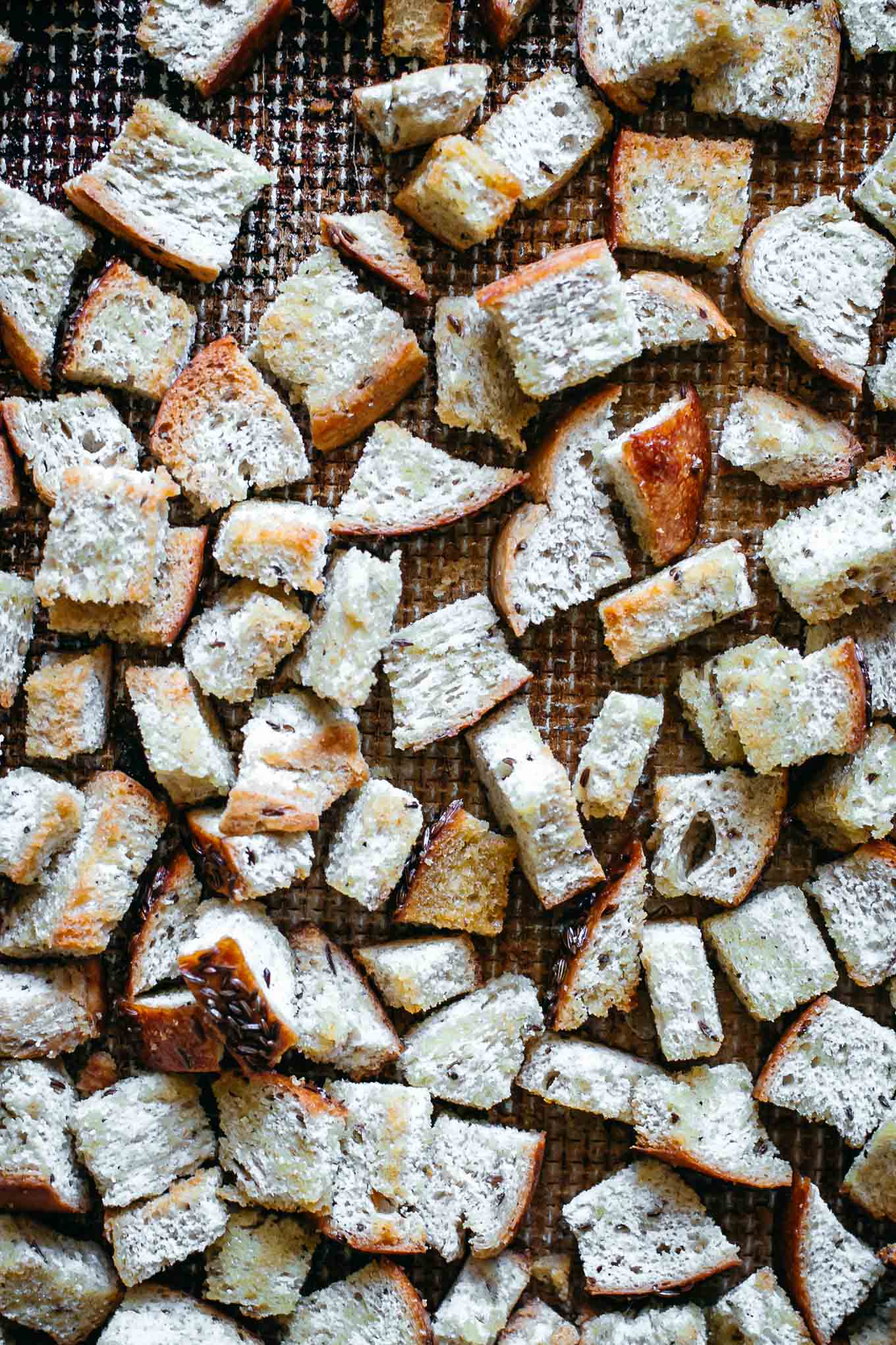 cooked croutons on a baking sheet