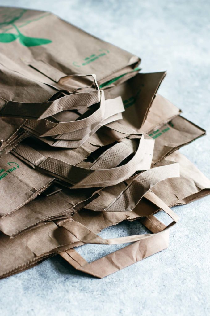 stack of paper grocery bags on a countertop