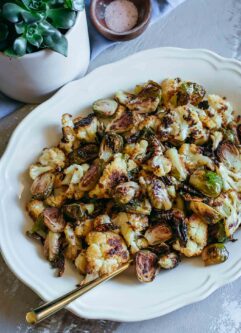 roasted brussels sprouts and cauliflower on a platter