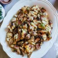 roasted brussels sprouts and cauliflower in a serving dish