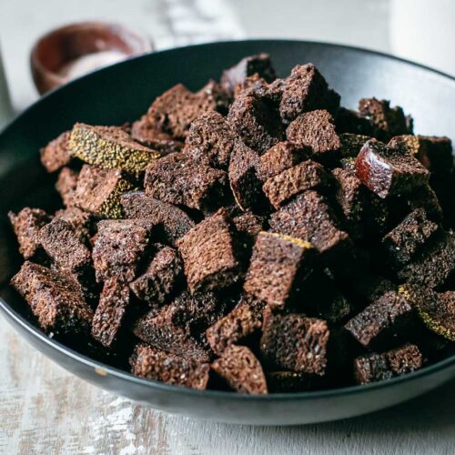 bowl of pumpernickel croutons on a counter