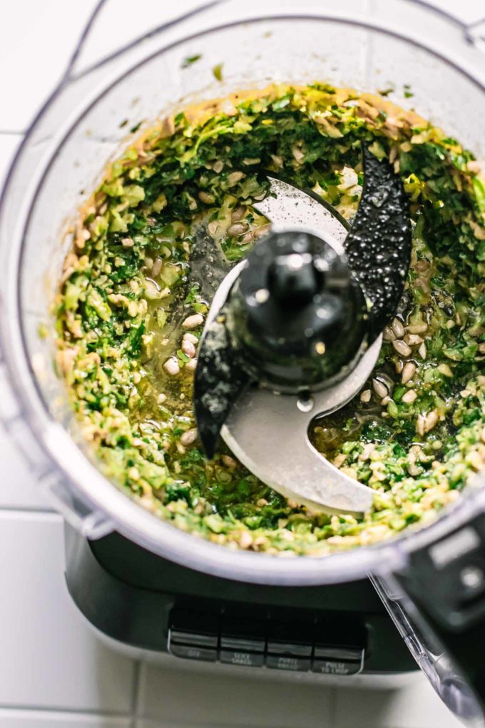 blended pesto made from celery leaves in a food processor