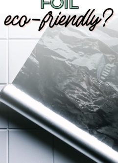 a photo of aluminum foil rolled out on a white countertop with the words "is aluminum foil eco-friendly?" in black writing