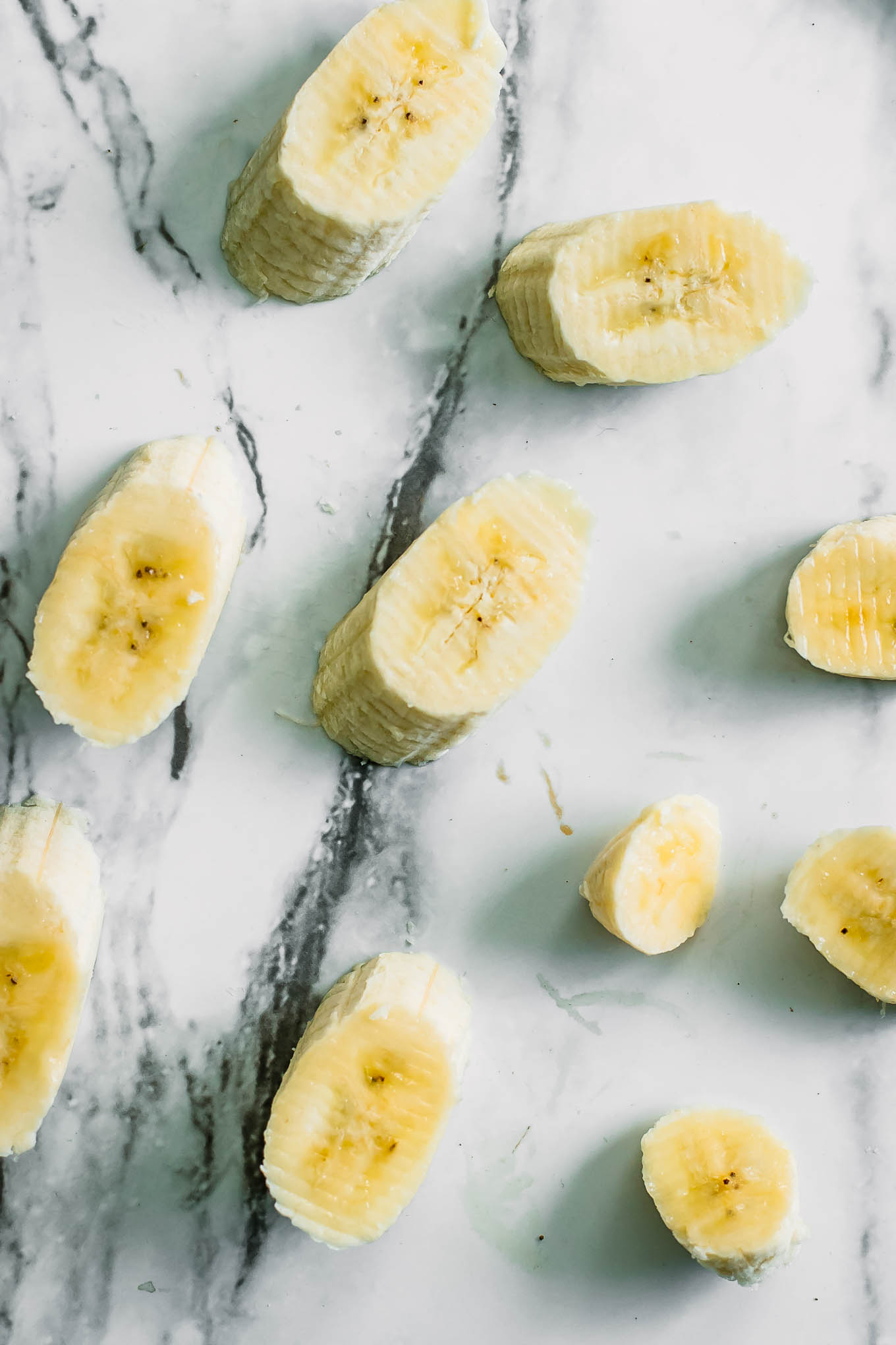 sliced banana on a marble tabletop