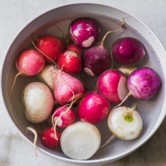 cut radishes in a bowl filled with water