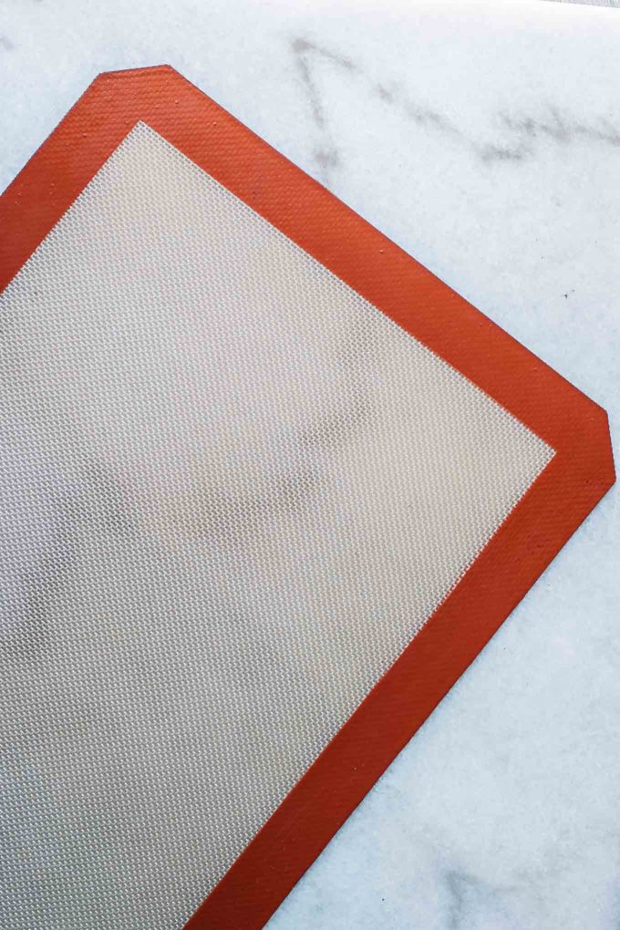 a silicone baking mat on a white countertop
