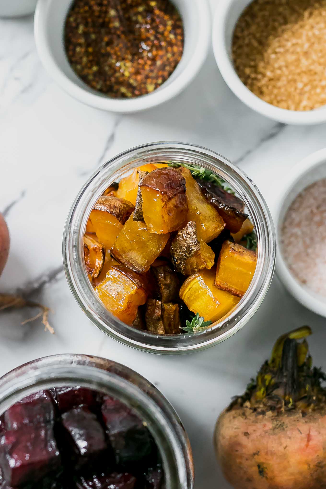 a jar of beets with pickling spices