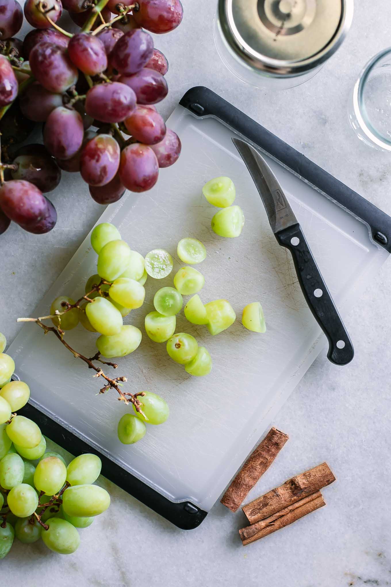 sliced grapes on a cutting board