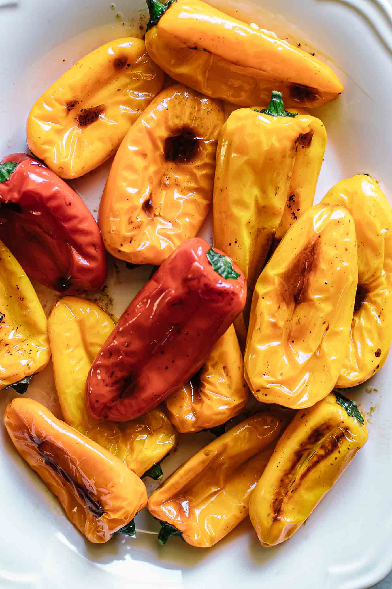 baked sweet peppers on a white side dish