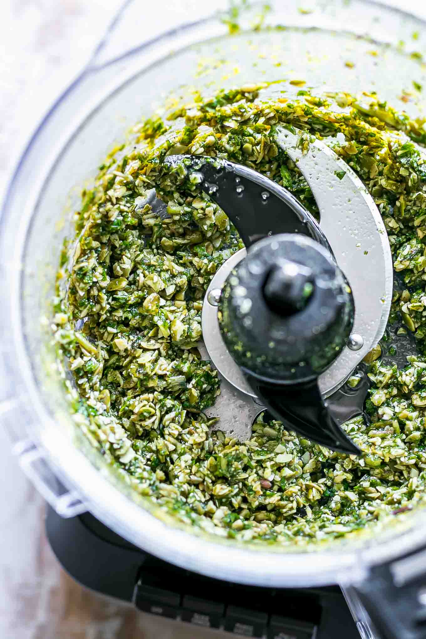 blended pesto with mint leaves in a food processor