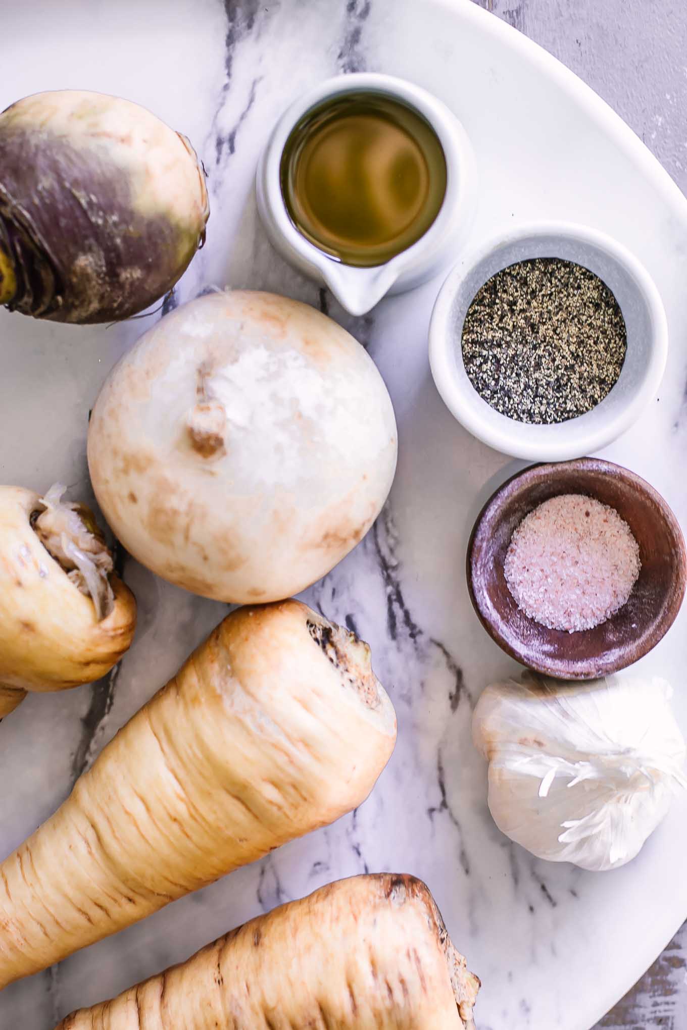 parsnips, turnips, garlic, oil, salt, and pepper