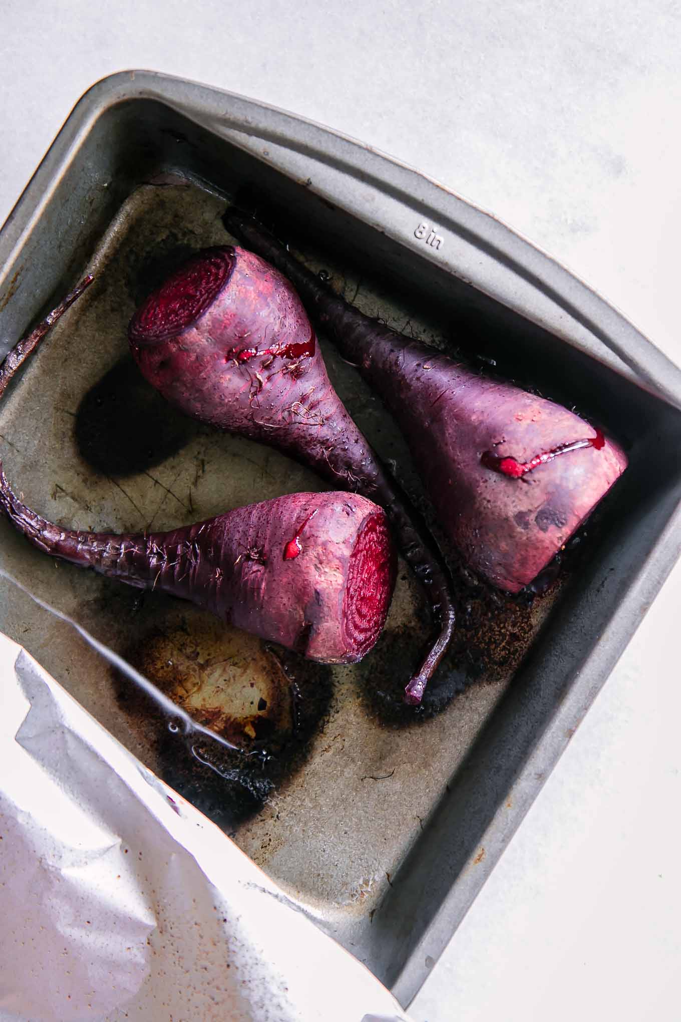 beets in a roasting pan with foil after baking