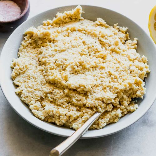 a bowl of cashew ricotta cheese on a white table