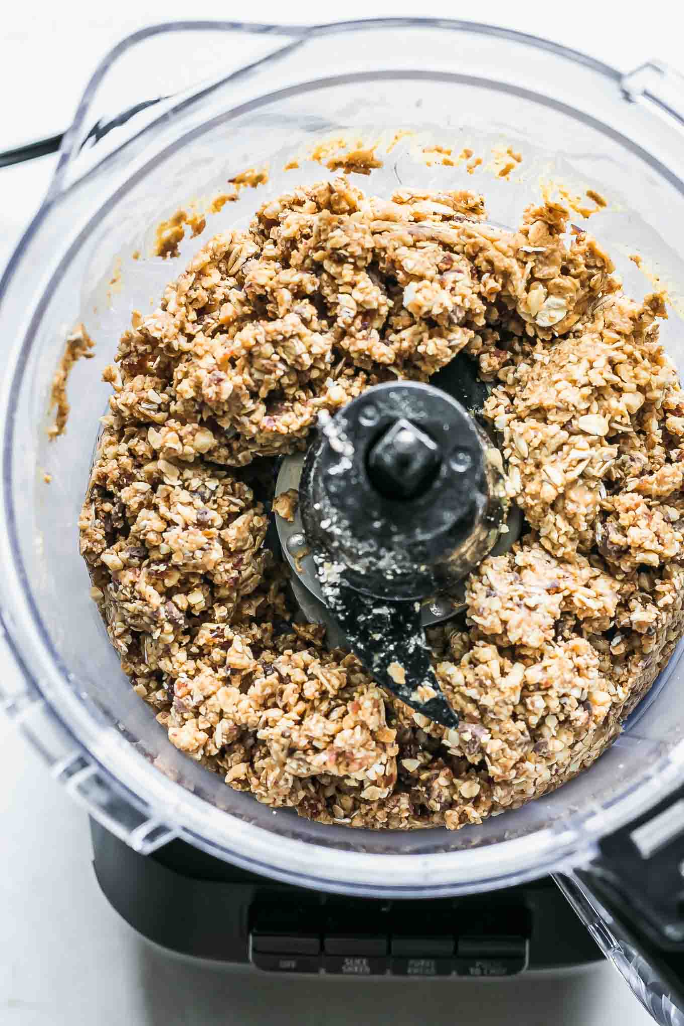 granola bar ingredients blended inside a food processor