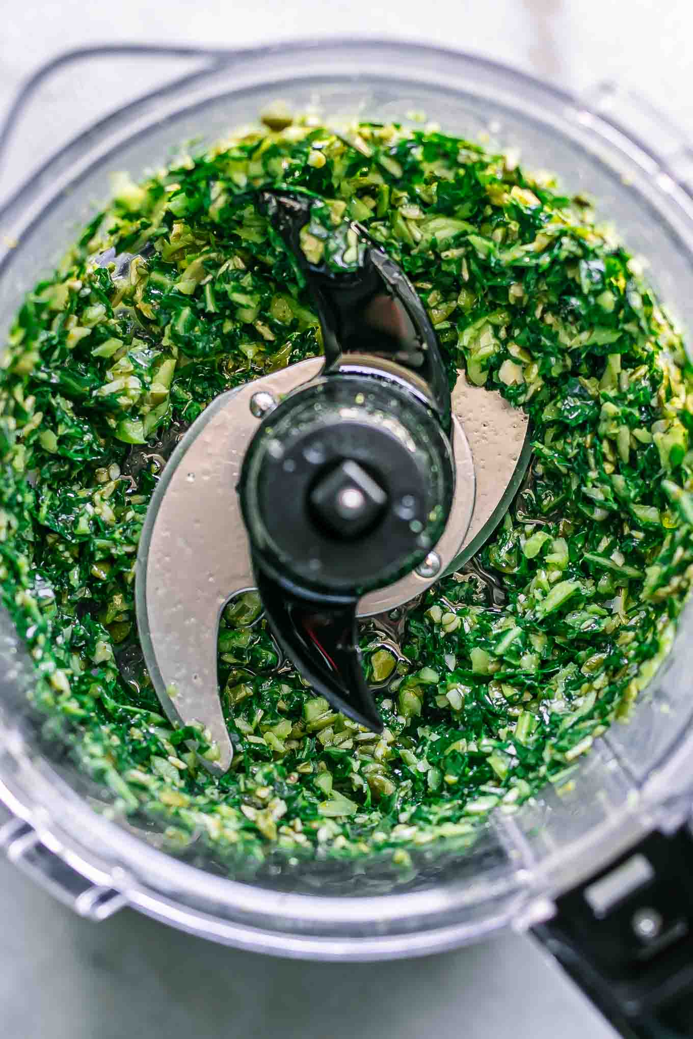 blended pesto with collard greens in a food processor