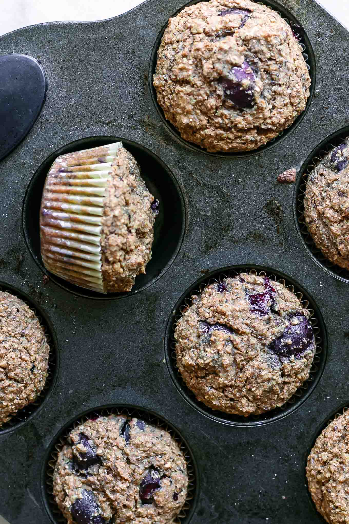 cherry bran muffins in a muffin tin after baking
