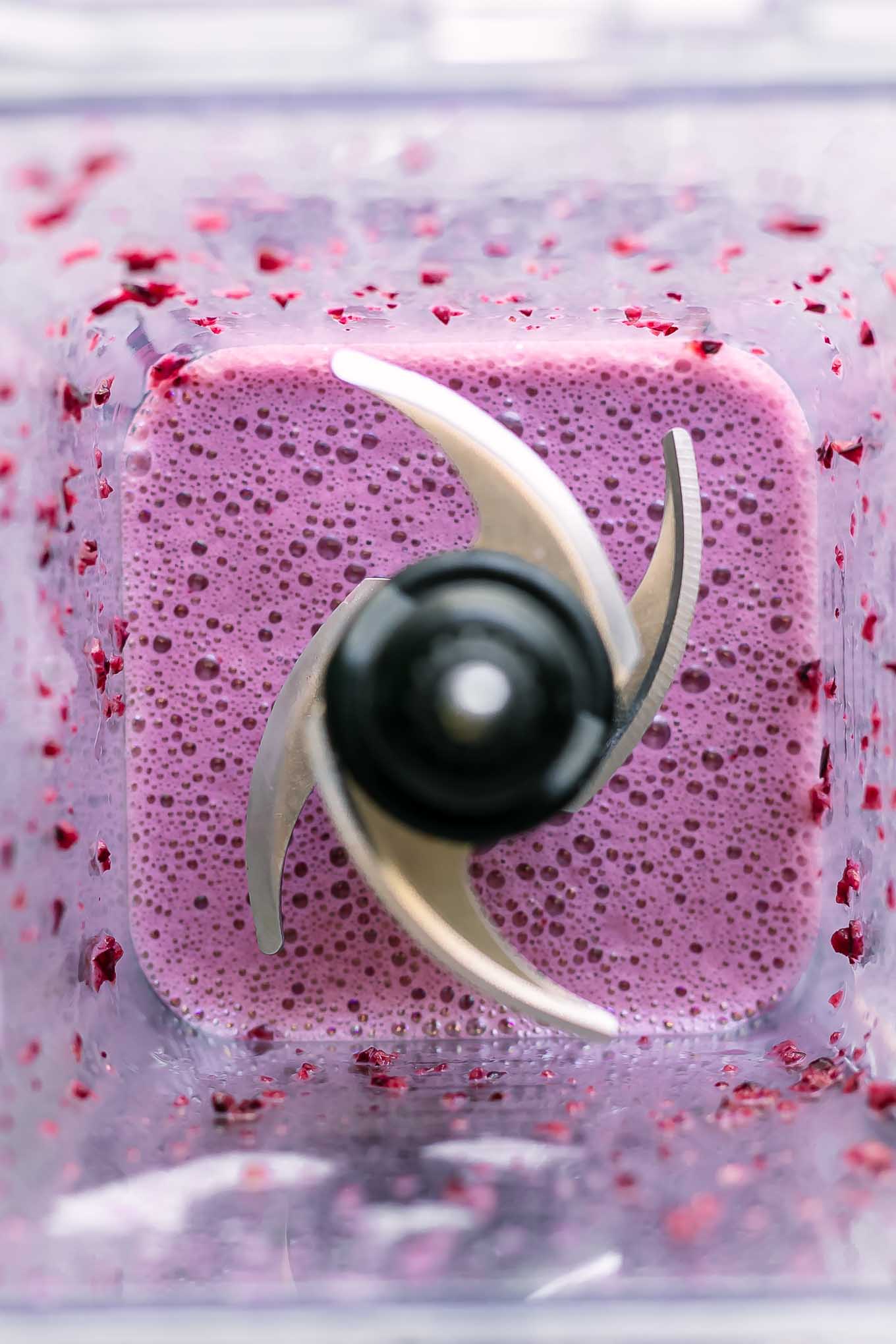 blended cherry-flavored milk inside a blender