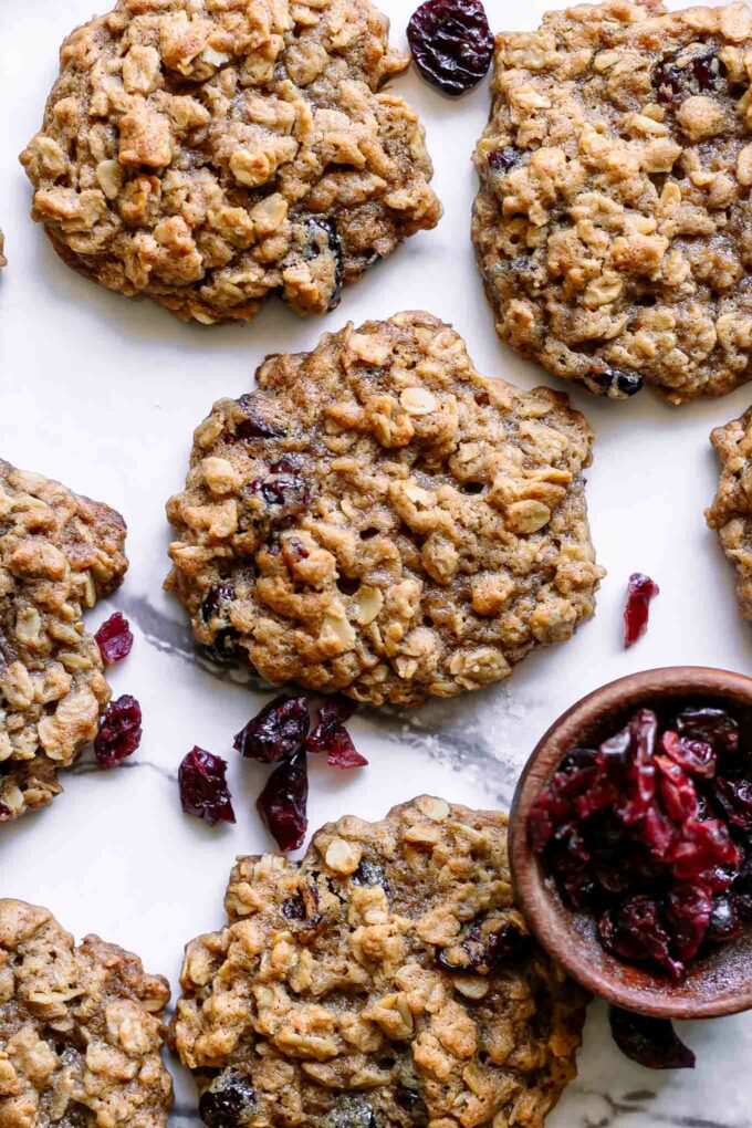 vegan oatmeal cookies with cranberries on a white table