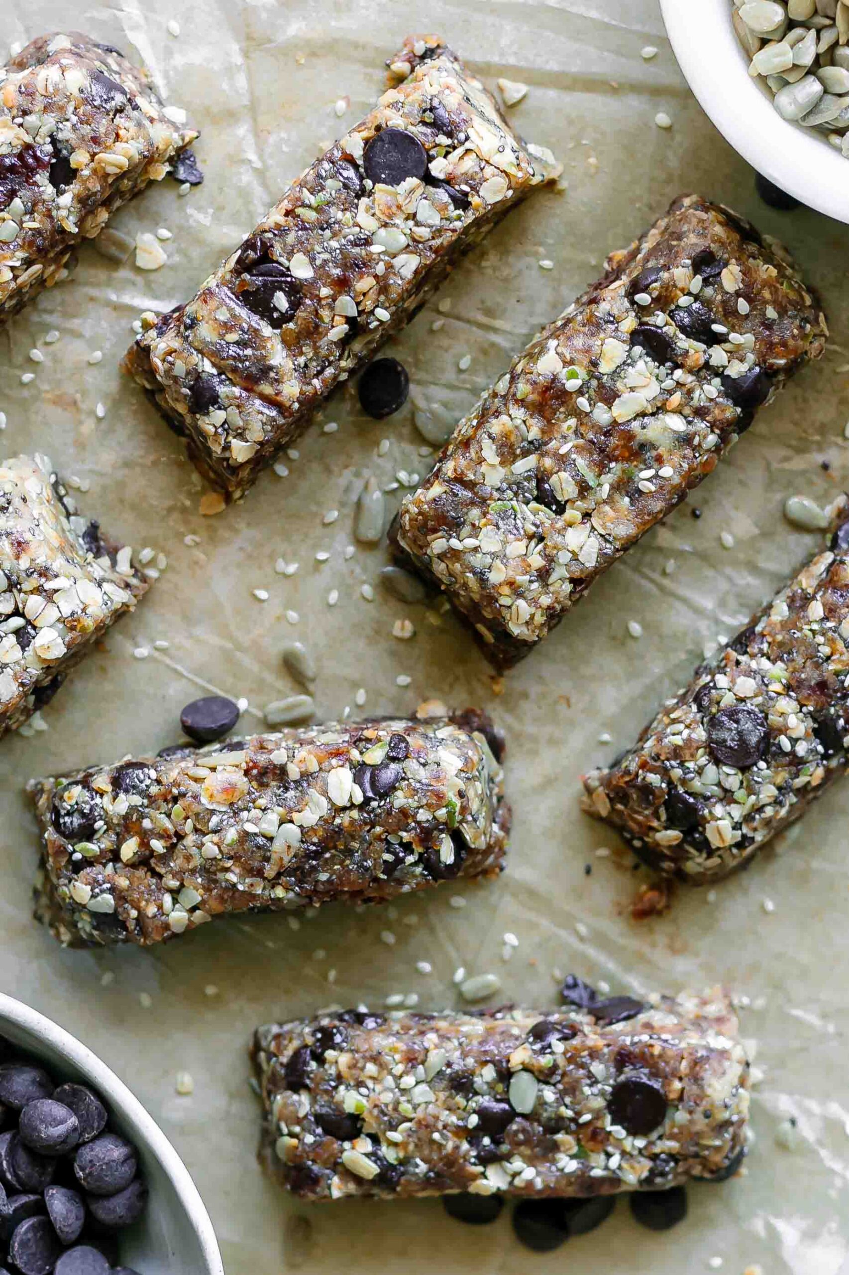 homemade tahini crunch bars with chocolate on a table
